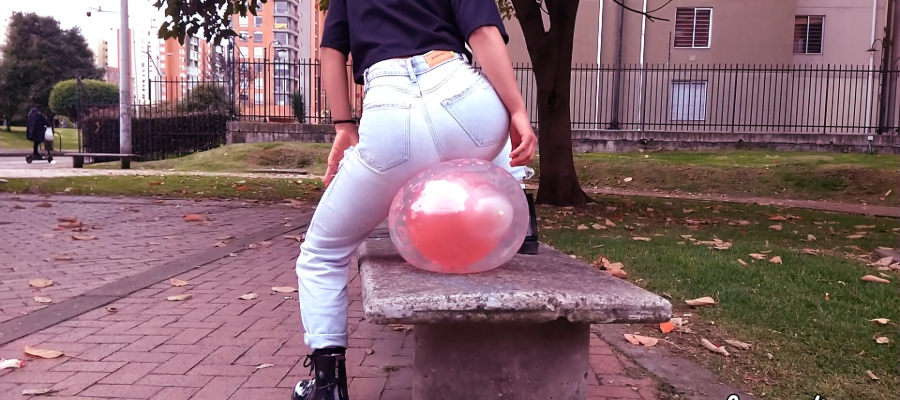 Petite Girl Sit popping in the Public park