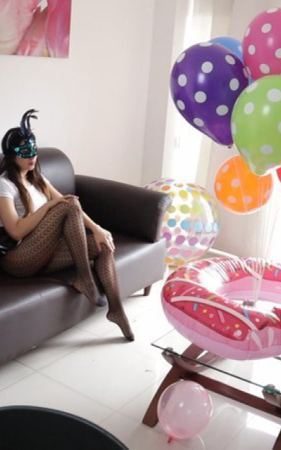 Cute Girl playing with an Inflatable Whale and Big balloons to sit2pop