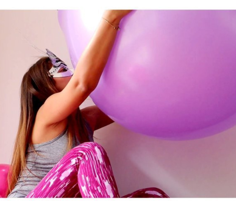 ​​Hugging and kissing the giant balloon​